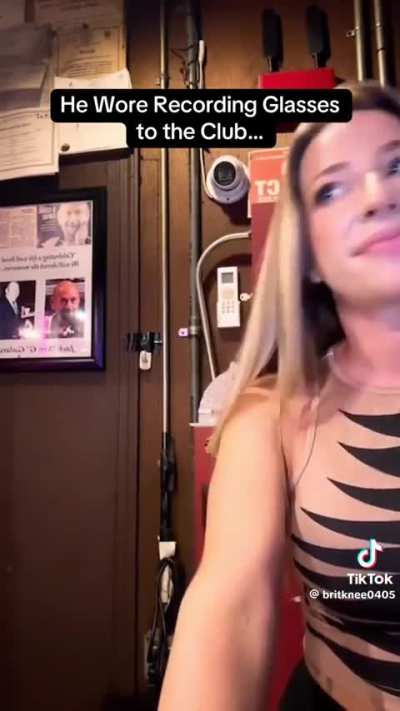 Door person for a strip club catches a customer trying to enter with camera glasses