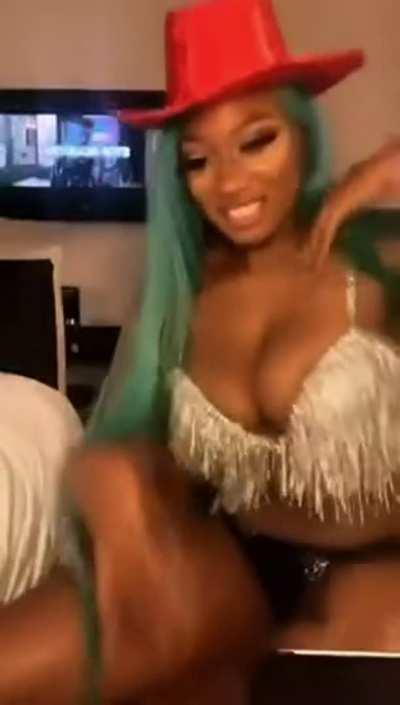 Megan Thee Stallion riding an imaginary cock