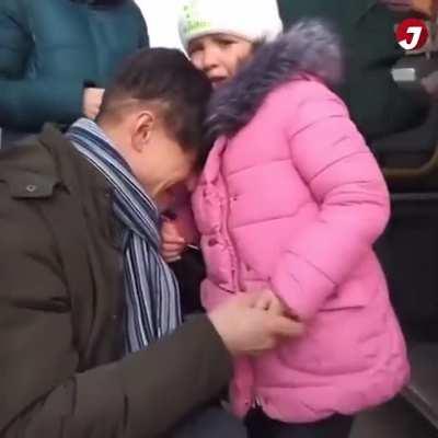 A Ukrainian father says goodbye to his family, while he stays behind to fight the Russians