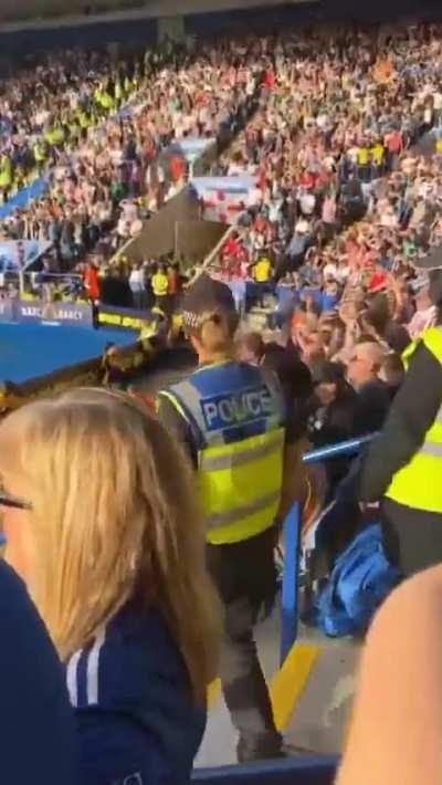 Emotions are high at a football match.