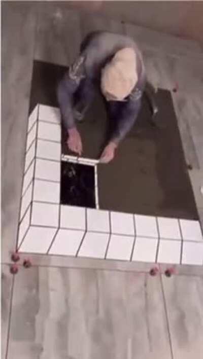 The way this guy places the tiles is so...