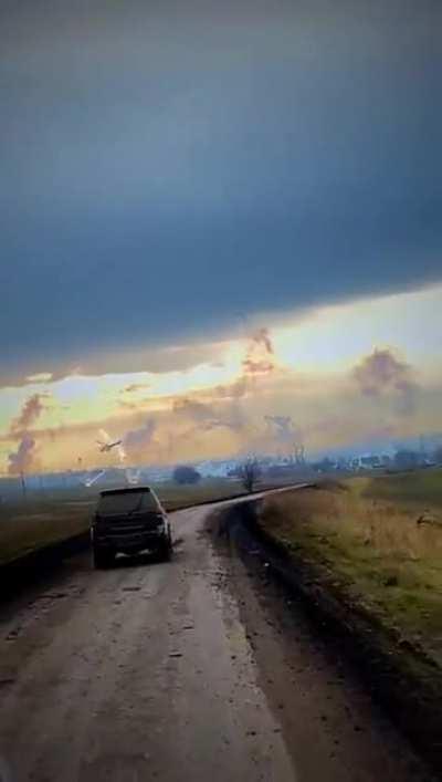 Ukrainian vehicles approaching Bakhmut with UA helis operating at low level