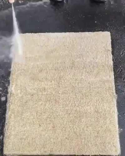 Dirty carpet being cleaned