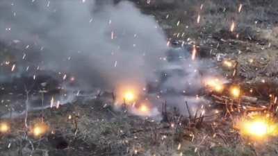 Ukrainian FPV strike on Russian position detonates ammunition storage