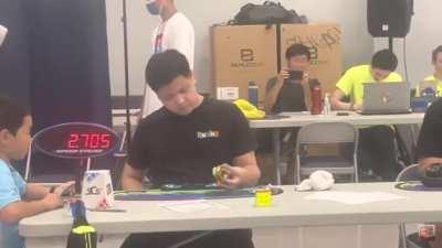 This guy solving a Rubik’s cube one handed in 6 seconds.