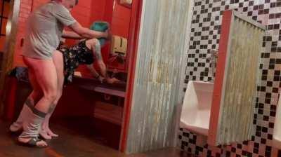 Would you risk getting caught fucking in the men’s restroom at the local sports bar?