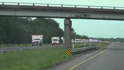 A massive convoy of Ambulances travelling toward Louisiana after Hurricane Laura made landfall