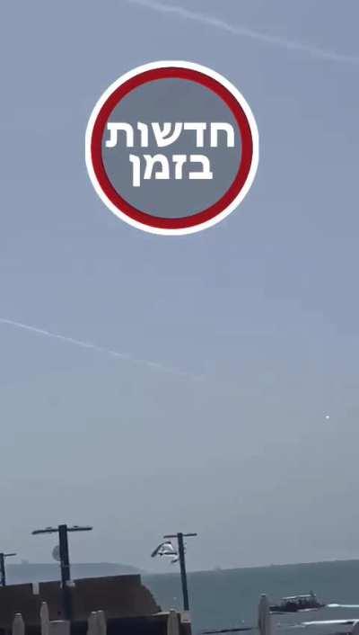 Close view of iron dome hitting a drone next to akko's beaches