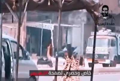 Insurgent mortar team in action in the middle of a busy street. With unhappy ending. Iraq.