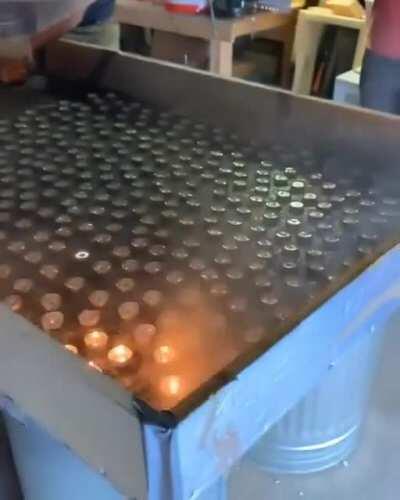 Extinguishing candles using Sulfur Hexafluoride.