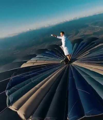 Standing on top of a hot air balloon