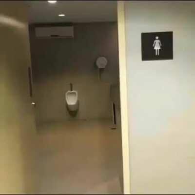 Woman urinal