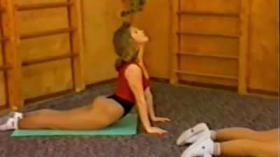 Mother and daughter doing their fitness in the 1990s in thong leotards