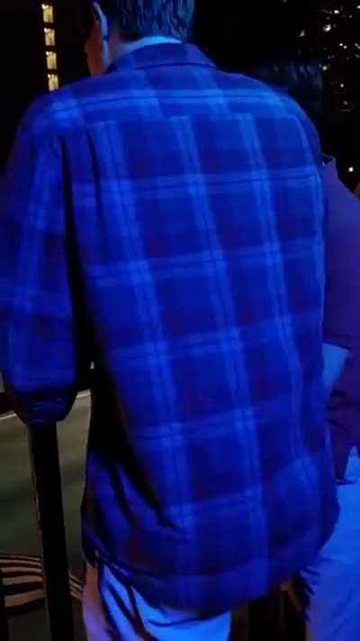 The pattern on this guy’s plaid shirt changes depending on the colour of the light.