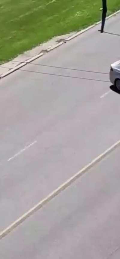 Dude throws rocks at car, instantly regrets it