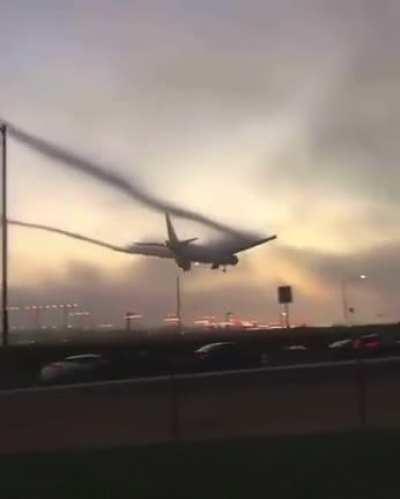 This is awesome! ... Cloudy-sunset landing of Boeing 777-300ER Philippine airlines