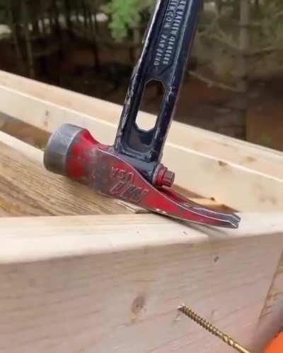 Handy trick to get a truss board lined up properly using a screw and a hammer