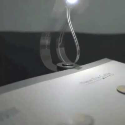 This minimalistic reading lamp with a magnetic switch. It also doubles as a bookmark - very noice!