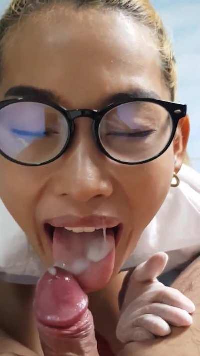 Naughty asian nurse loves examining his load with her tongue