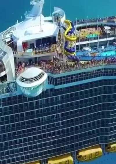 One of the world’s largest cruise ships has a children's water park, a full-size basketball court, an ice-skating rink, a zip line that is 10 decks high, a 1400-seat theater, an outdoor aquatic theater with Olympic-height platforms