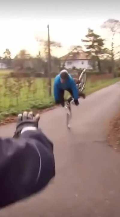 Police Officer using the force to stop guy riding a bike