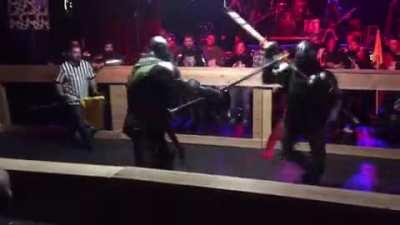 Axe Fight in Vegas (blunt steel axes). Clip from a steel fighting tournament in Vegas where fully armored combatants would fight 1v1 with 6 ft long pole axes for a cash prizes and a full suit of custom armor from Poland.