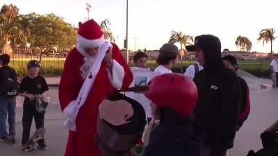 Tony Hawk giving out skateboards and clothing to local kids and then donating tonnes of toys to the Salvation Army, all while dressed as &quot;Santa Hawk&quot;.