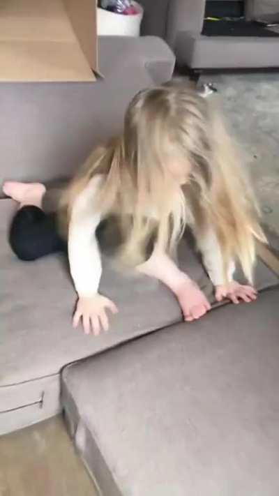 Kids enjoying cardboard slide that mom made