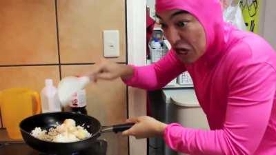 Pink guy cooks fried rice and raps