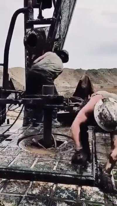 Manhandling an oil well drilling rig