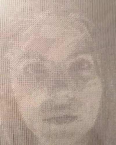 A portrait made entirely out of dice