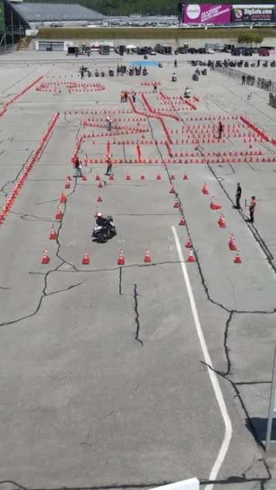 Motorcycle cop finished the course with no cones falling over