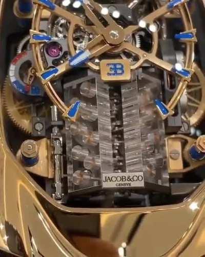 This watch with a fully functioning miniature replica of the Bugatti Chiron engine built in