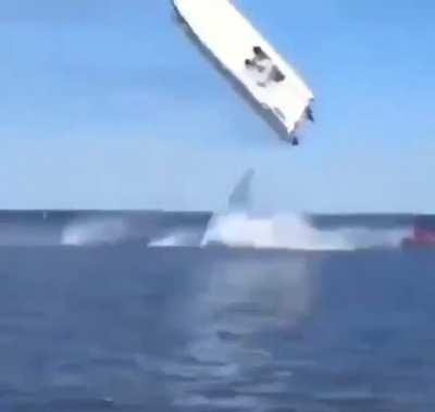 Crazy boat crash. 2 people ejected