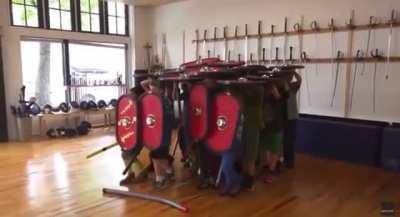 Kids demonstrating the sheer effectiveness of the Roman Testudo formation.