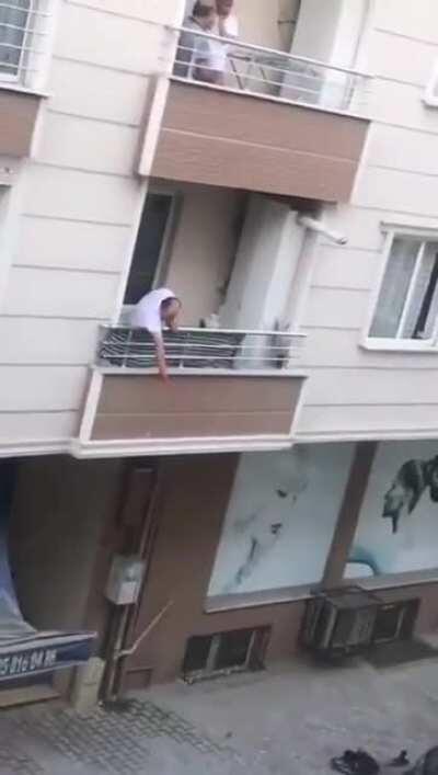 turkish man falls from balcony while fighting