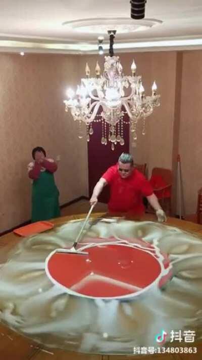 Cleaning a circular glass table