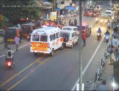 Women in a scooty causes cartoonish pileup of convoy.