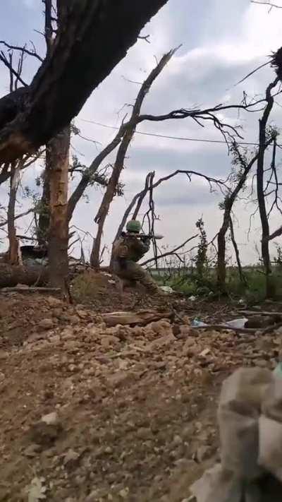 Colombian/Ukrainer fires an rpg in Ukraine