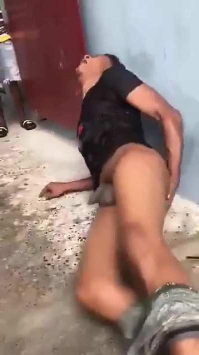 [NSFW] Thief in Guyana receives a vicious beating from community vigilantes