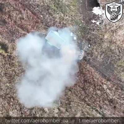 Ukrainian drone spots a Russian four-wheeler/quad bike outside a dugout and destroys it.