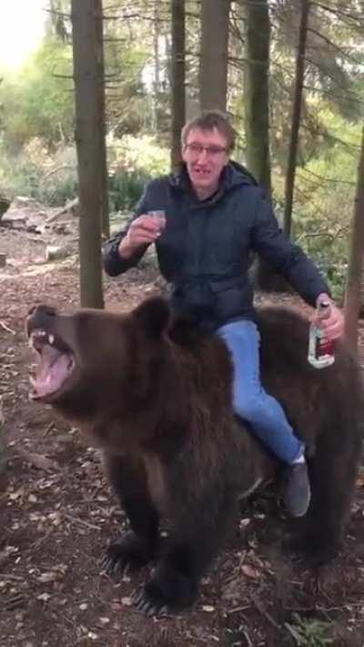 Man Vibing With Beer and Bear