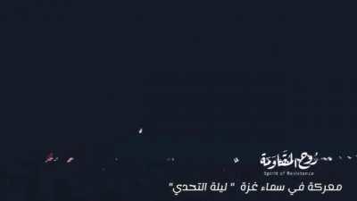 Music video shows tens of rocket launches from what appears to be Gaza's residential neighborhoods and Iron Dome interceptors. May 2021 conflict between Israel and the Palestinian factions.