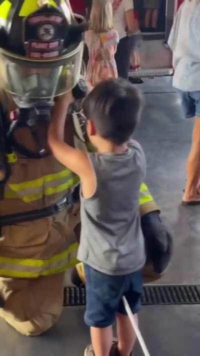 A blind 6-year old boy came to a fire station wanting to 