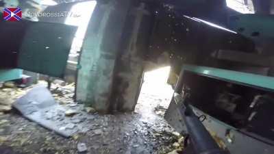 Ukrainian Separatist launches an anti-personnel RPG round during fighting for Donetsk Airport - October 14, 2014