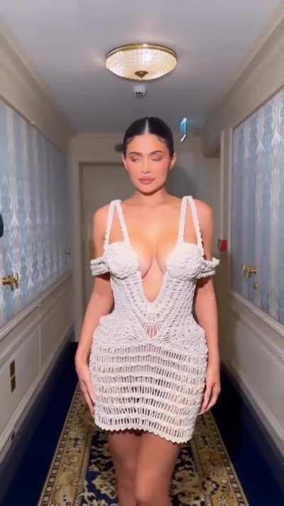 In white mesh dress from Acne Studios Fashion Show