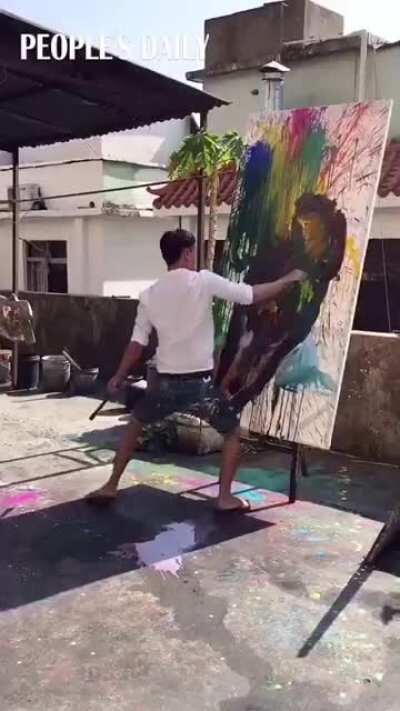 Chinese painter showing off his impressive skill