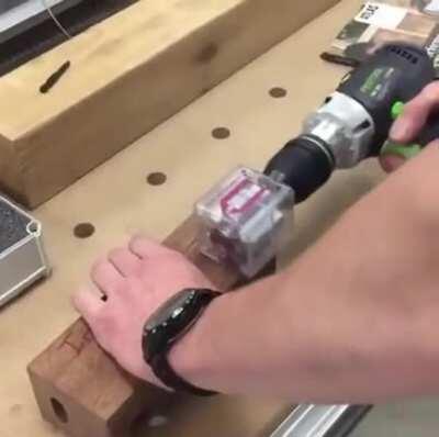 Turning screws inside a piece of wood using a magnetic drill