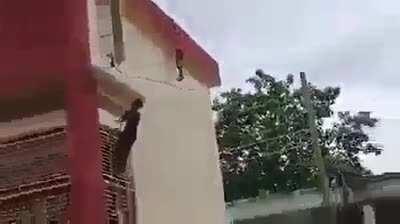 Indian guy becomes Spider Man to save the kid hanging from the roof 🔊