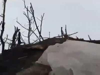 Ukrainian go pro footage shows a group of soldiers defending their trench against advancing Russian invaders on their position unknown location and date